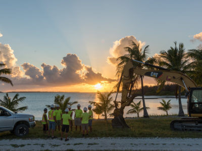 Brice employees in front of sunset